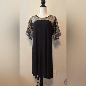 Chic Black Dress with Embroidered Floral Sleeves